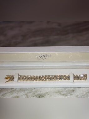 Vintage THAI DBJ 925 Sterling Silver
Tennis Bracelet Gold Vermeil on zirconia